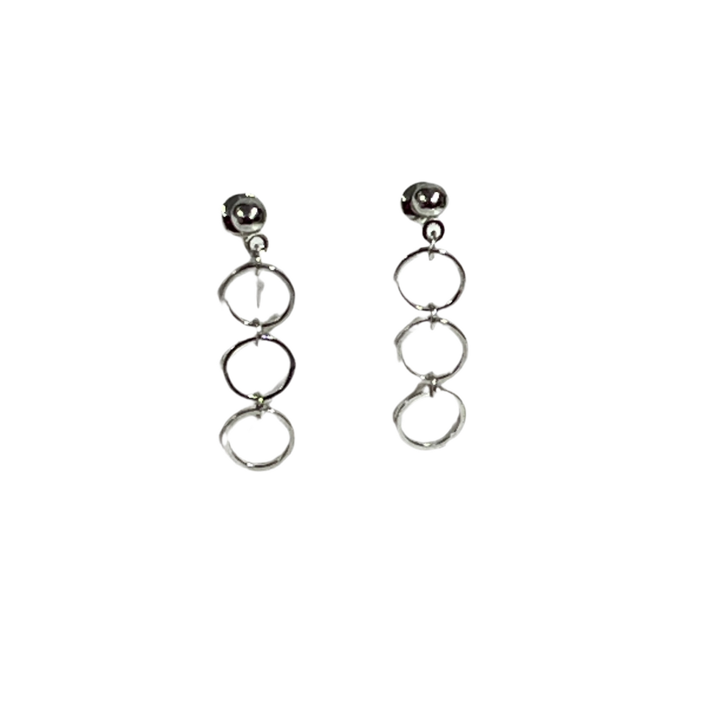 Pair of silver hoop earrings on a white background