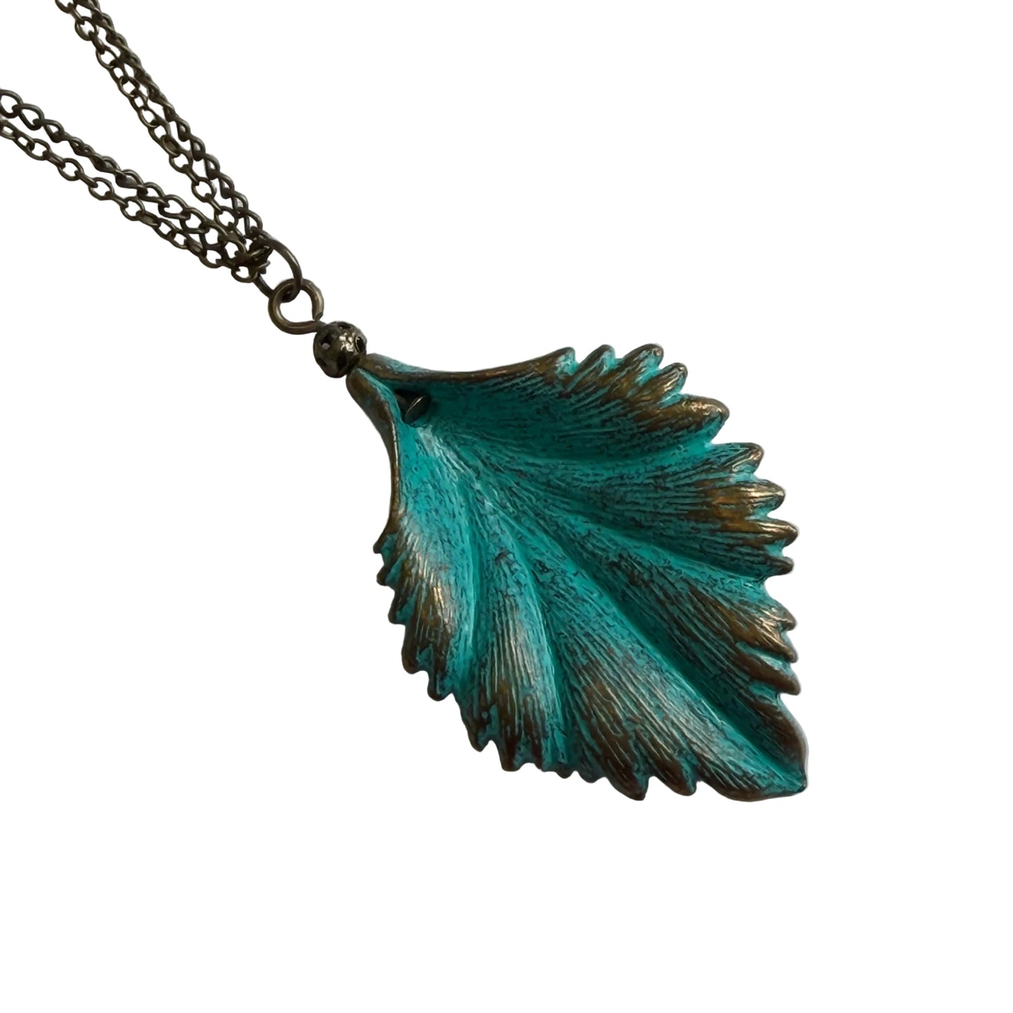 Verdigris leaf-shaped pendant on a bronze chain