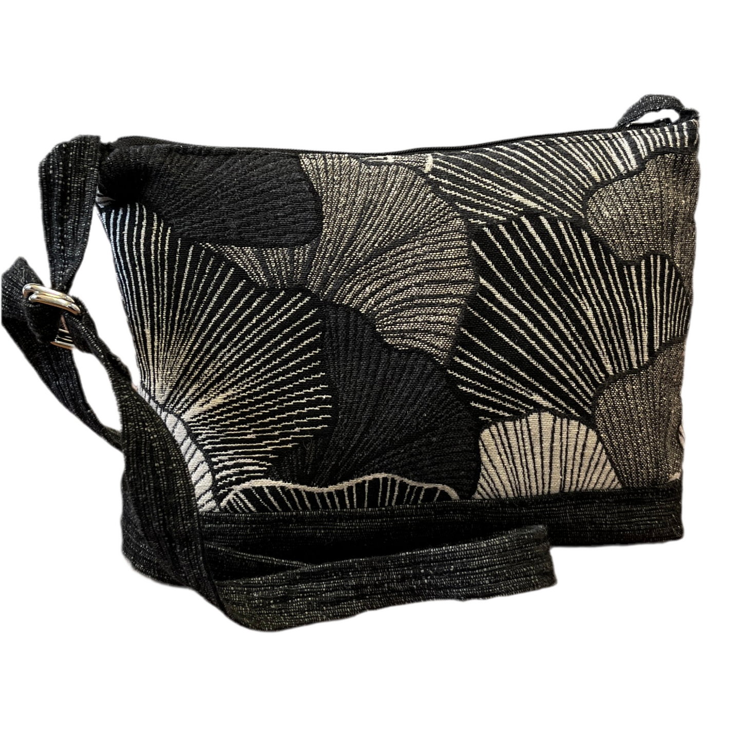 Black and white Gingko leaf patterned bag on a white background