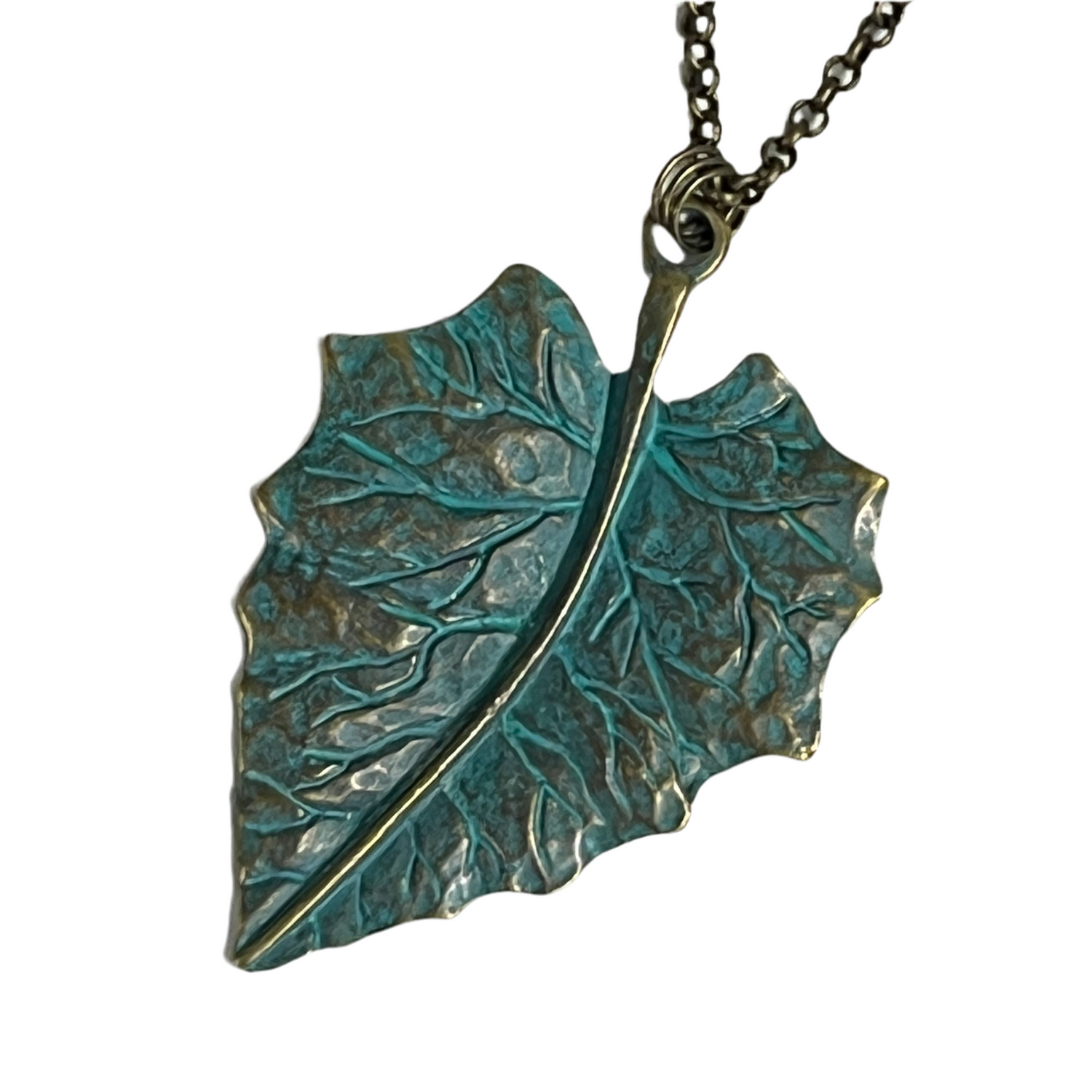 Bronze leaf-shaped pendant on a chain against a white background