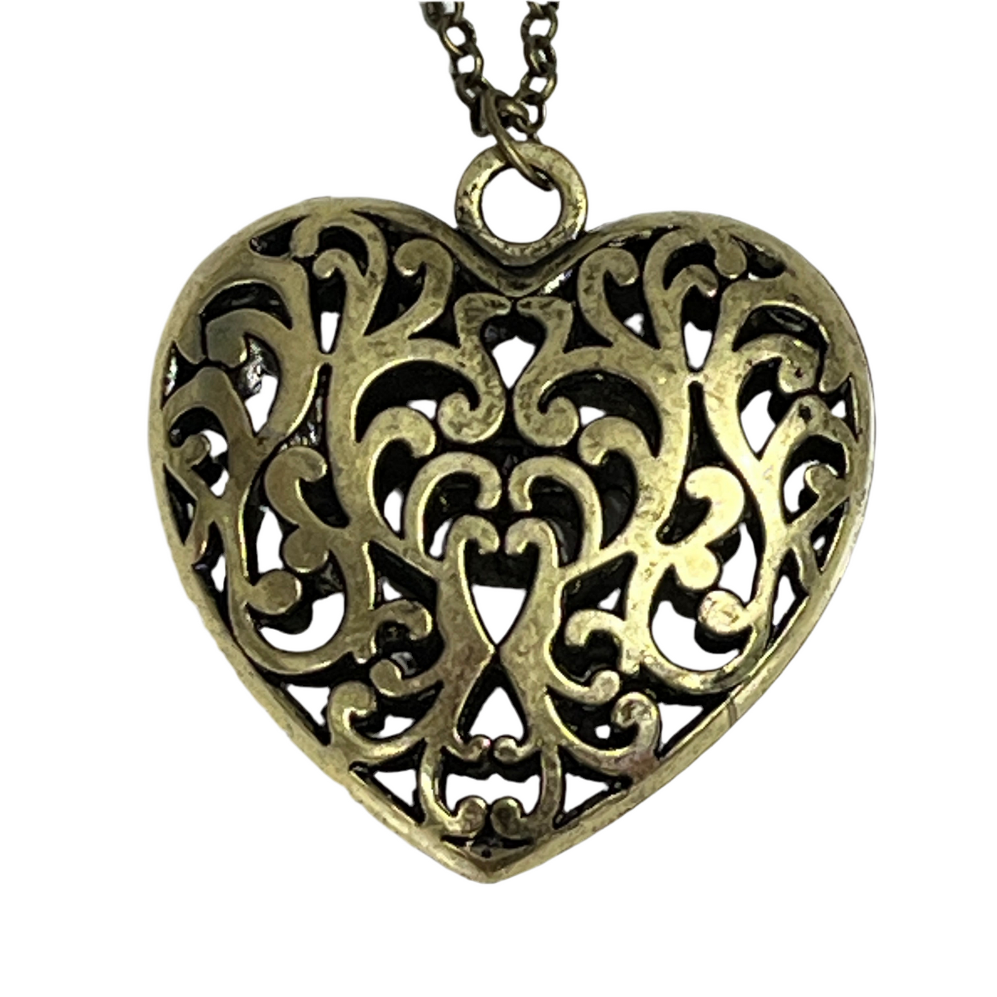 Bronze heart-shaped filigree pendant on a white background