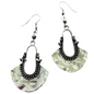 Pair of silver antique look earrings on a white background