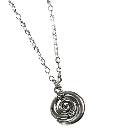Silver koru spiral pendant necklace on a white background