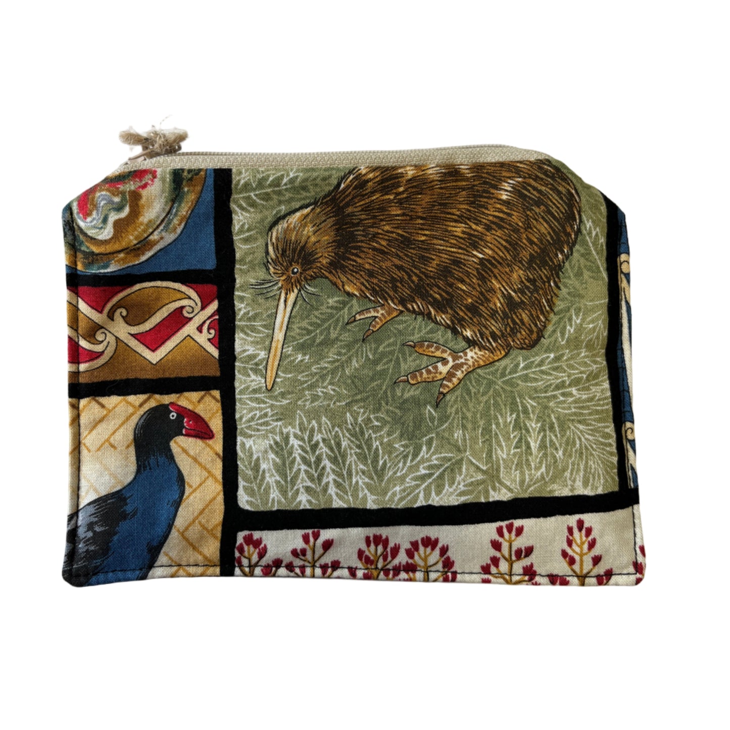 Kiwiana purse showing native kiwi bird, pūkeko, and NZ flora in a block panel design.