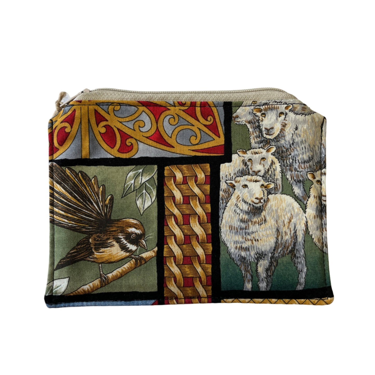 Front of handmade Kiwiana purse with colourful panels featuring fantail, sheep, and traditional patterns.