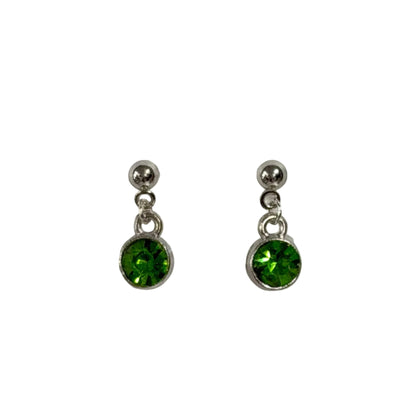 Pair of silver earrings with green gemstones on a white background