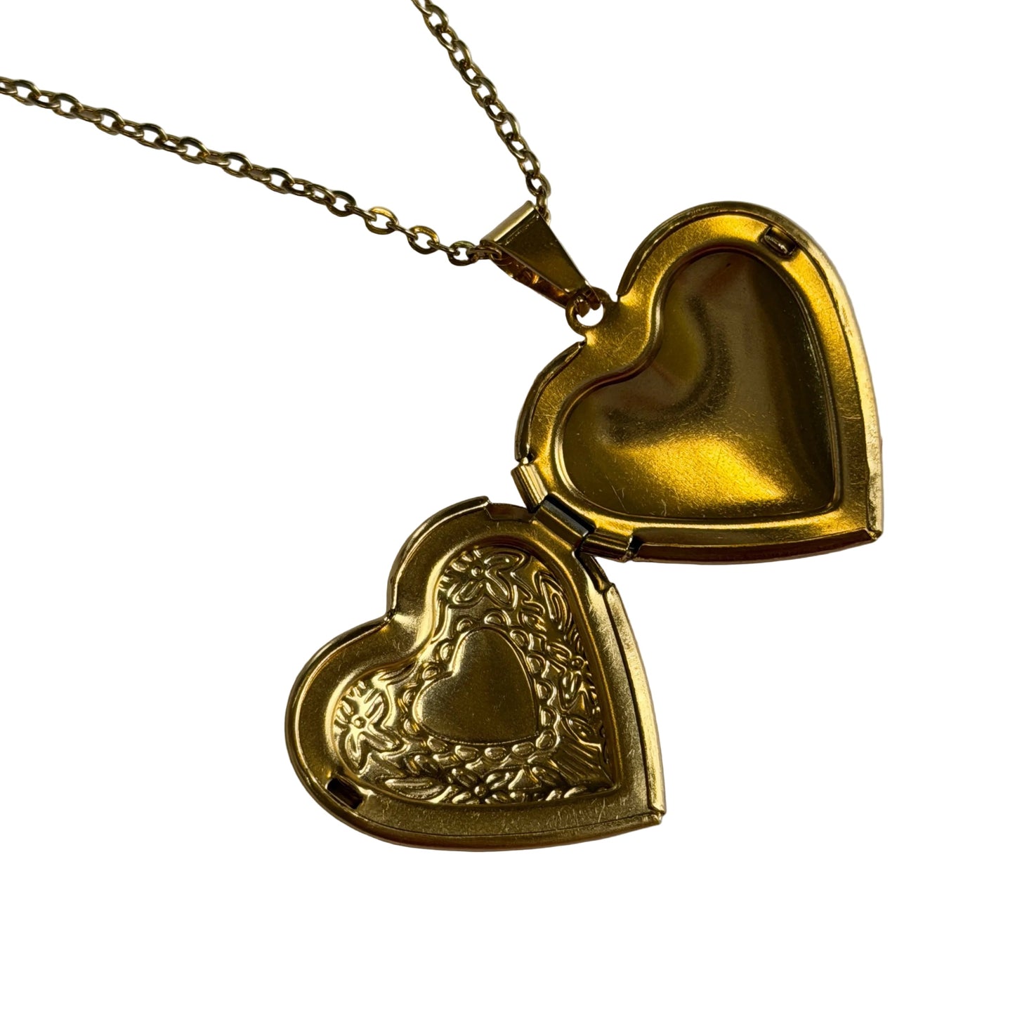 Gold heart-shaped locket on a chain 