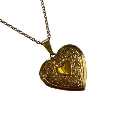 Gold heart-shaped pendant on a chain 