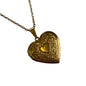 Gold heart-shaped pendant on a chain 