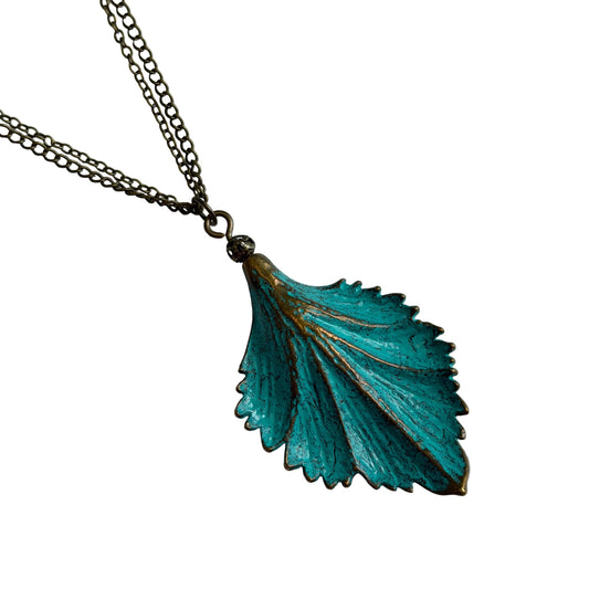 Verdigris leaf-shaped pendant on a bronze chain