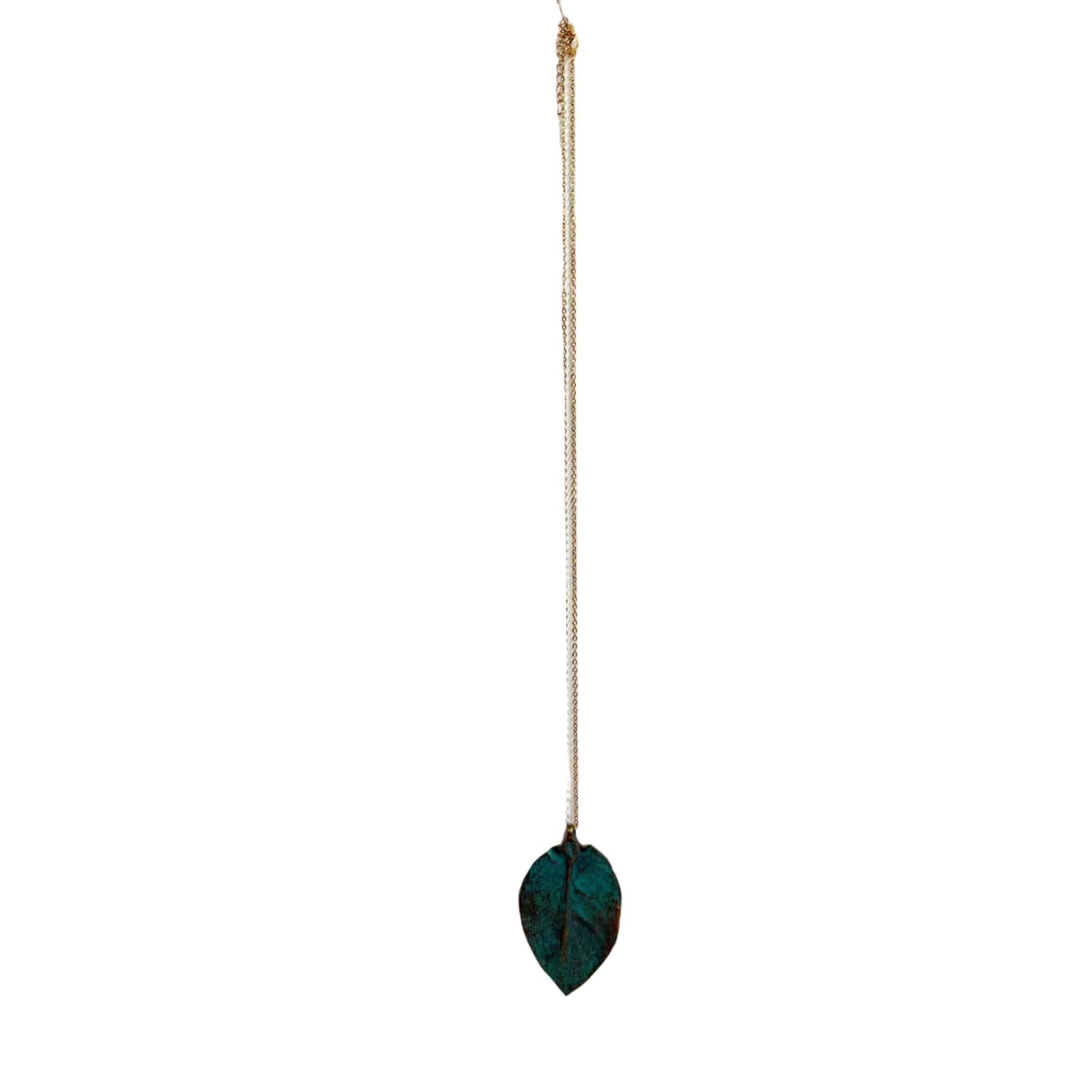Green leaf-shaped pendant on a chain against a white background