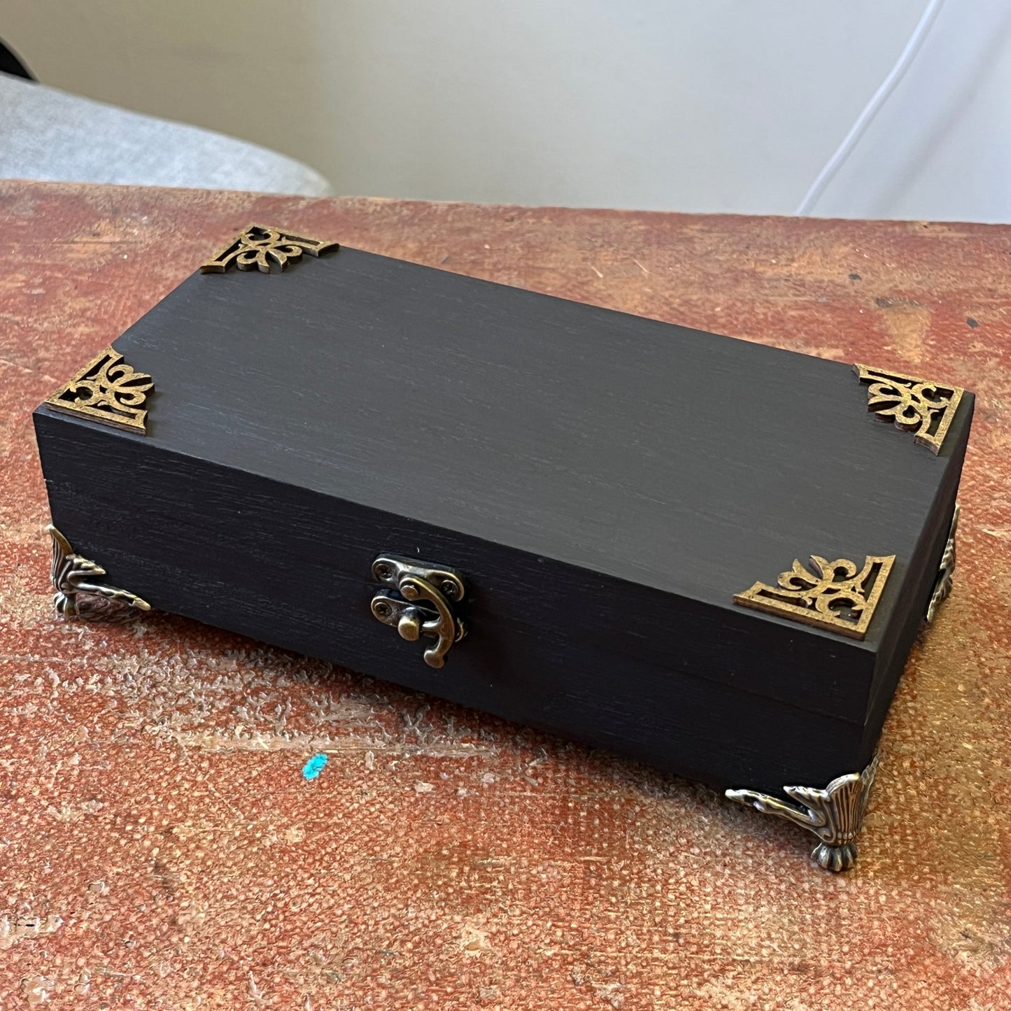Black box with gold accents jewellery box brass feet