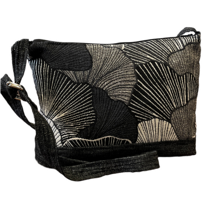 Black and white Gingko leaf patterned bag on a white background