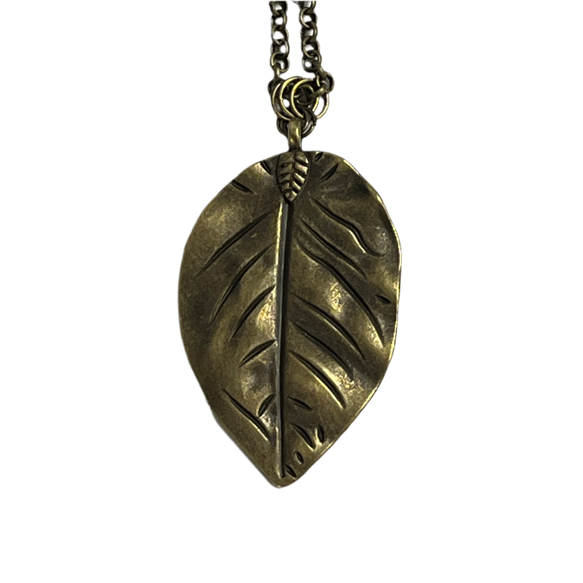 Bronze leaf-shaped pendant on a chain against a white background
