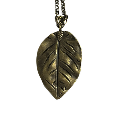 Bronze leaf-shaped pendant on a chain against a white background