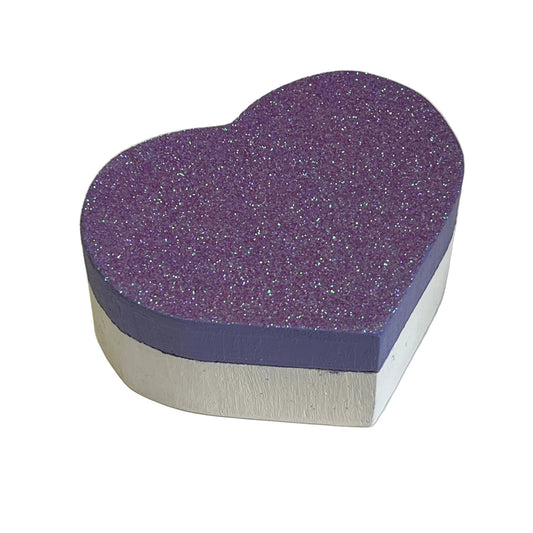 Heart-shaped purple and silver box on a light background